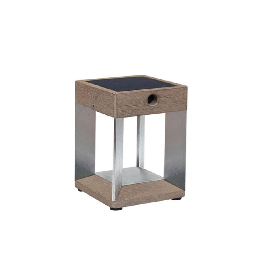 Small solar lantern with wooden finish and metal legs on a white background by Les Jardins available at Spacio retail stores in Mumbai & Kolkata.  
