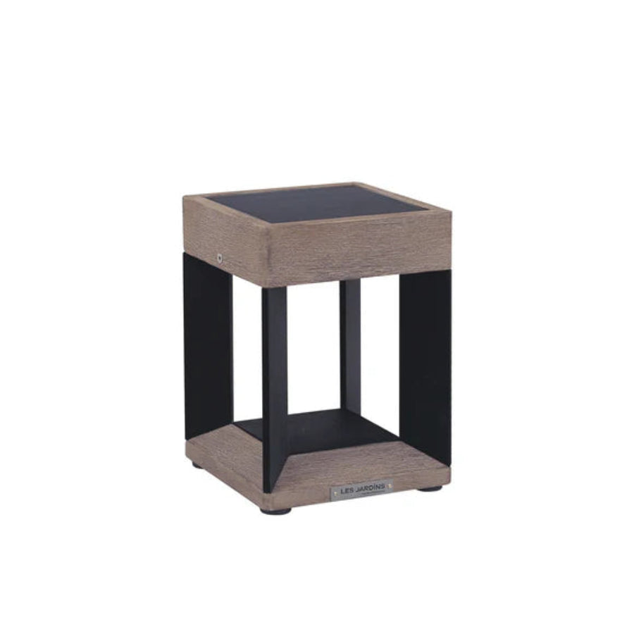 Solar Lantern with a wooden finish and black legs on a white background by Les Jardins available at Spacio retail stores in Mumbai & Kolkata.  