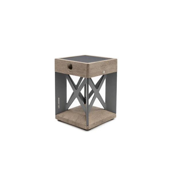 Small wooden solar table lamp with a black top on a white background by Les Jardins available at Spacio retail stores in Mumbai & Kolkata.  