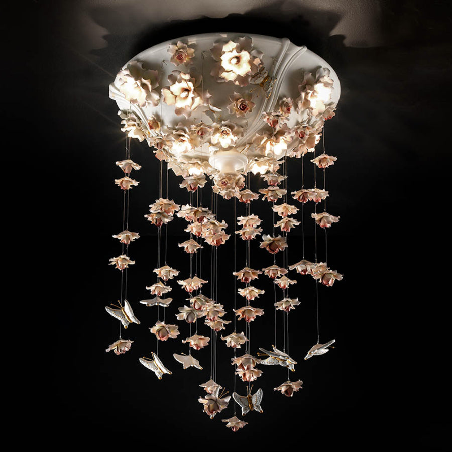Decorative chandelier with floral design on a black background