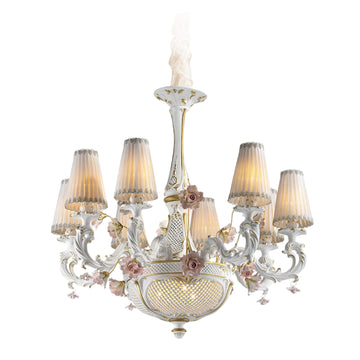 Decorative ceramic chandelier with floral elements on a white background by Lorenzon available at Spacio in India. 