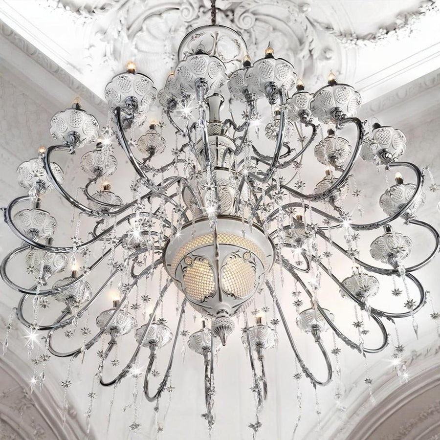 Luxurious ceramic chandelier with crystal accents on a decorative ceiling