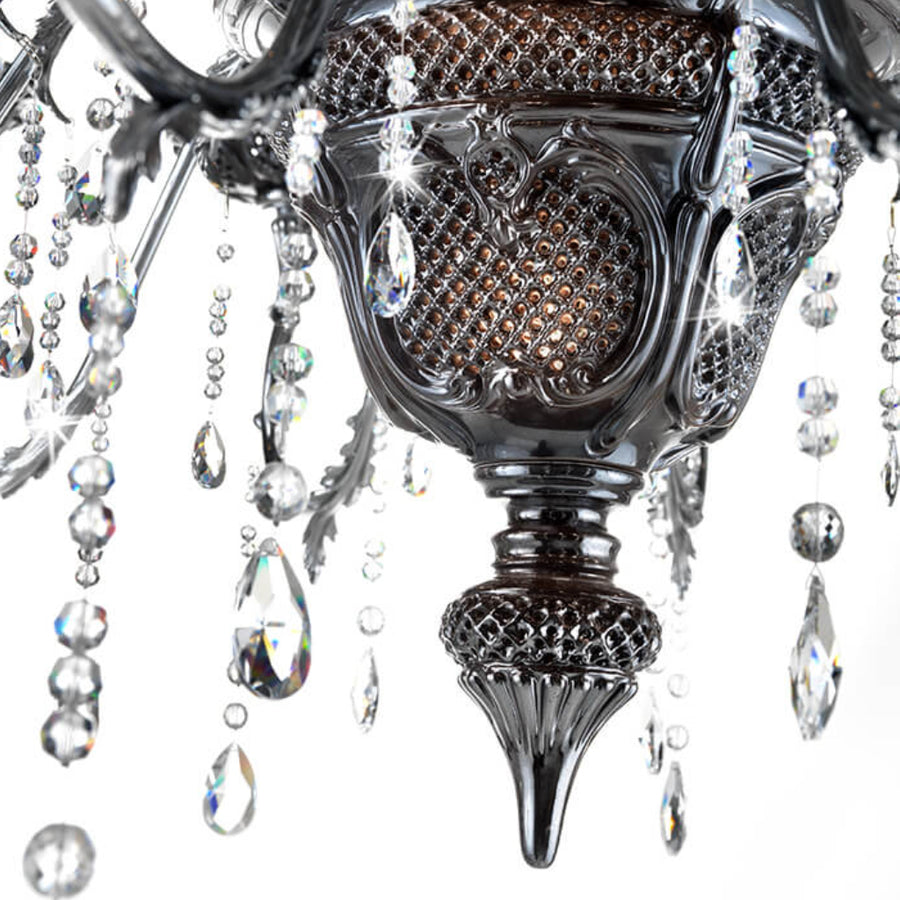 Close-up of an ornate chandelier with crystal elements in black finish