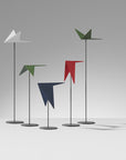 A group of Madlab's ML Animal Mood Birds (5pc set) standing on a table.