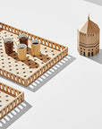 A Madlab ML Utopia Collection Octo Box, a handmade set of wooden trays with various items on them, inspired by Madrid.