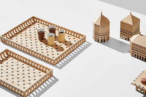 A Madlab ML Utopia Collection Octo Box, a handmade set of wooden trays with various items on them, inspired by Madrid.