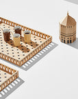 A set of Madlab ML Utopia Collection Square Boxes with various items on them.