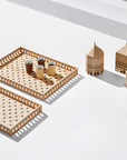 A set of Madlab ML Utopia Collection Square Boxes with various items on them.