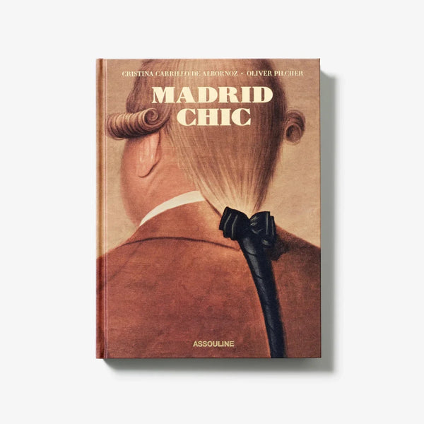 Madrid Chic by Assouline - Luxury Coffee Table Book at Spacio India
A sophisticated edition from Assouline, featuring a unique hardcover with golden typography, ideal for interior styling and luxury book collections.
