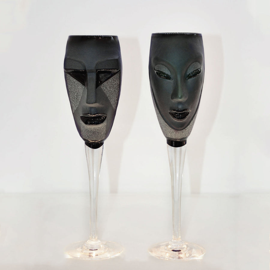 Maleras Crystal Champagne Glass Kubik Black with Electra Black Champagne Glass from Masque collection on a white back ground for modern interiors available at Spacio India from the Drink ware of Bar Accessories Collection.