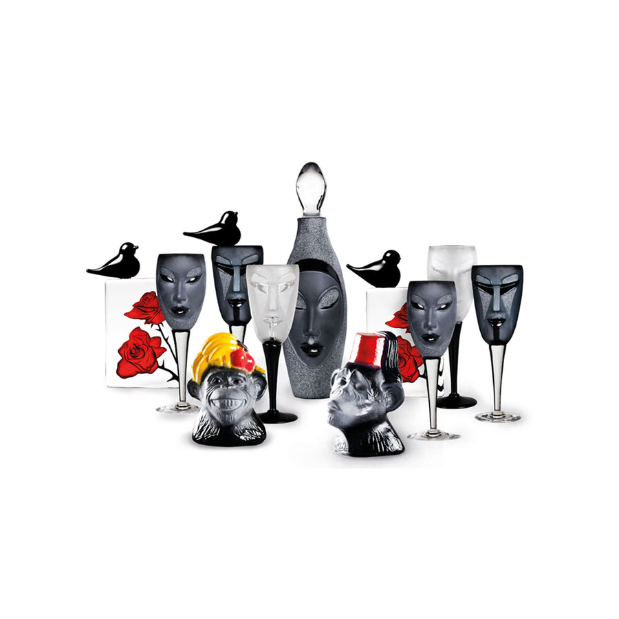 Maleras Crystal Champagne Glass Kubik Black with other drink ware accessories and bird sculptures from Masque collection on a white back ground for modern interiors available at Spacio India from Bar Accessories Collection.