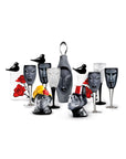 Maleras Crystal Electra Black Decanter with other drink ware accessories and bird sculptures from Masque collection on a white back ground for modern interiors available at Spacio India from Bar Accessories Collection.