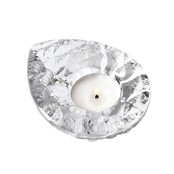 A beautifully designed Maleras Crystal Candle Holder Into The Votive Cone showcasing elegance, with a glowing candle gently illuminating any space.