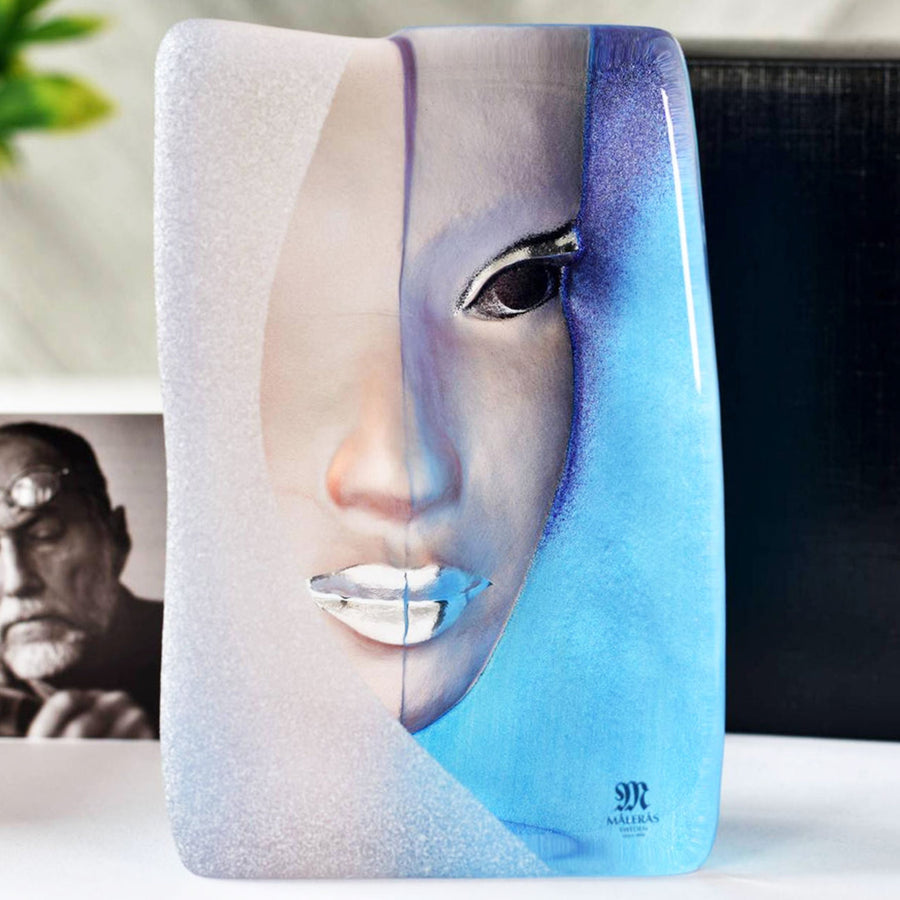 Maleras Crystal Mazzai Blue Sculpture with Mats Jonasson photo on a white surface in modern interiors available at Spacio India from Sculpture and Art Objects Collection of Crystal Sculptures.