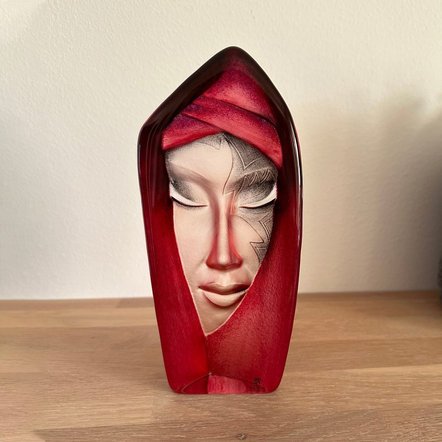 Maleras Crystal Batzeba Red Masq Sculpture on a wood console for modern interiors available at Spacio India from Sculpture and Art Objects Collection of Crystal Sculptures.