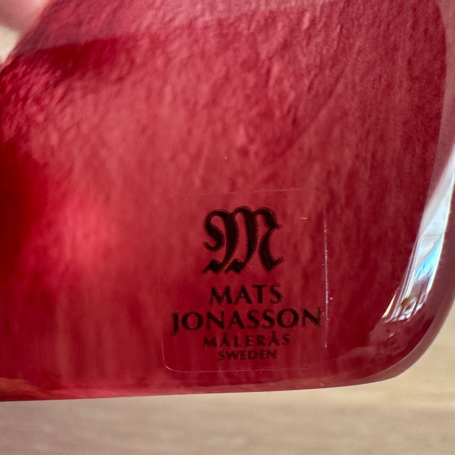 Signature of Mats Jonasson on Maleras Crystal Sculpture Batzeba Red Masq Sculpture for modern interiors available at Spacio India from Sculpture and Art Objects Collection of Crystal Sculptures.