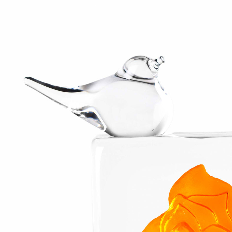Close look of Clear Bird Orange Rose Crystal Sculpture by Ludvig L??fgren from Maleras, Sweden available at Spacio India for Luxury Home Decor Sculpture & Art Objects Collection 