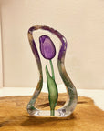 Maleras Crystal Sculpture Tulip Purple Small on a wooden table top, available at Spacio India from the Sculptures and Art Objects Collection