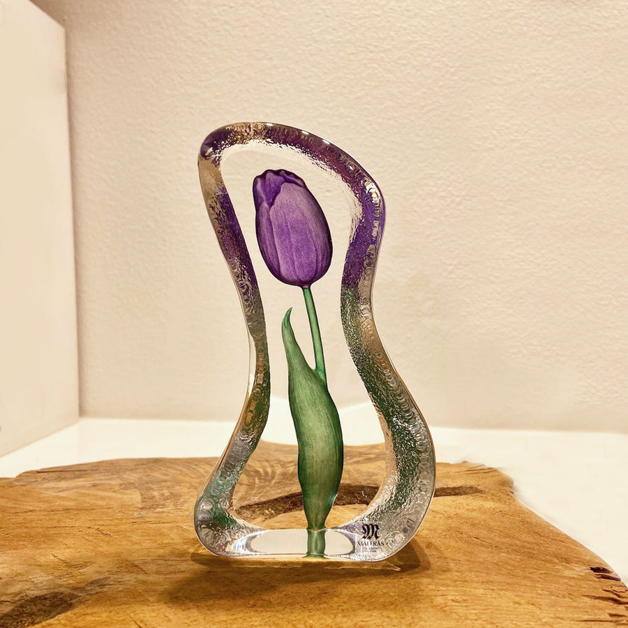 Maleras Crystal Sculpture Tulip Purple Small on a wooden table top, available at Spacio India from the Sculptures and Art Objects Collection