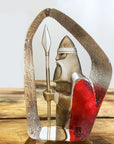 Maleras Crystal Sculpture Viking Red on a wooden surface in modern interior available at Spacio India from the Sculptures and Art Objects Collection.