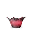 Red glass flower-shaped object on a white background