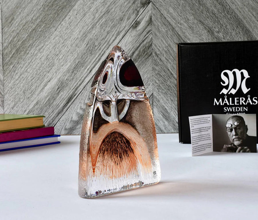 Decorative crystal sculpture of Viking from Maleras along with picture of Mats Jonassan