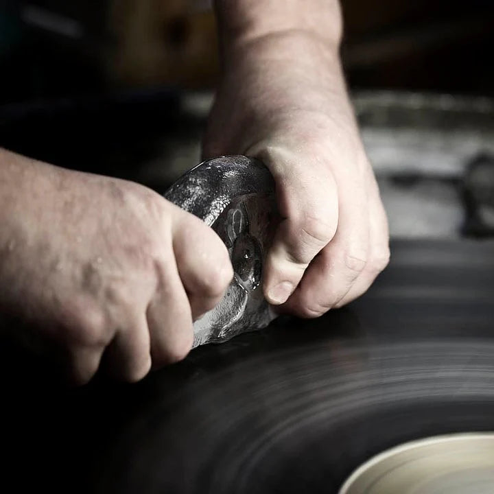 Maleras craftsmen in Sweden working upon a Maleras crystal sculpture in their factory