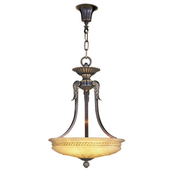 Decorative pendant light with a yellow alabaster shade on a white background