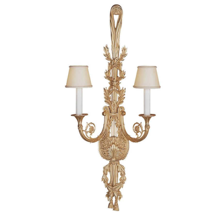 Decorative wall sconce with two candle-style lights on a white background