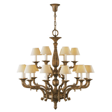 Decorative classic chandelier in bronze with beige fabric shades and eight light bulbs on a white background by Mariner, available at Spacio’s Mumbai & Kolkata retail stores in India.