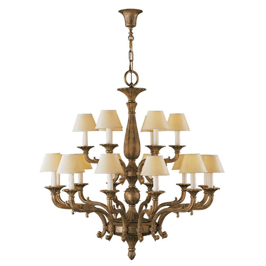 Decorative classic chandelier in bronze with beige fabric shades and eight light bulbs on a white background by Mariner, available at Spacio’s Mumbai & Kolkata retail stores in India.