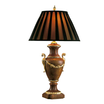 Decorative table lamp made of burgundy alabaster with a striped brown and black shade on a white background