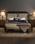 Luxurious bedroom with a large bed, nightstands, and lamps.