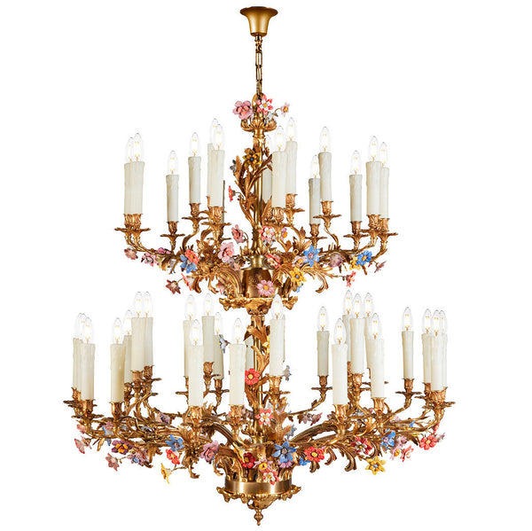 Decorative chandelier with floral details on a white background by Mariner, available at Spacio's Mumbai &?Kolkata retail stores in India.