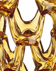 A close up of a Mario Cioni Crystal Arabesque Vase Amber yellow glass vase.