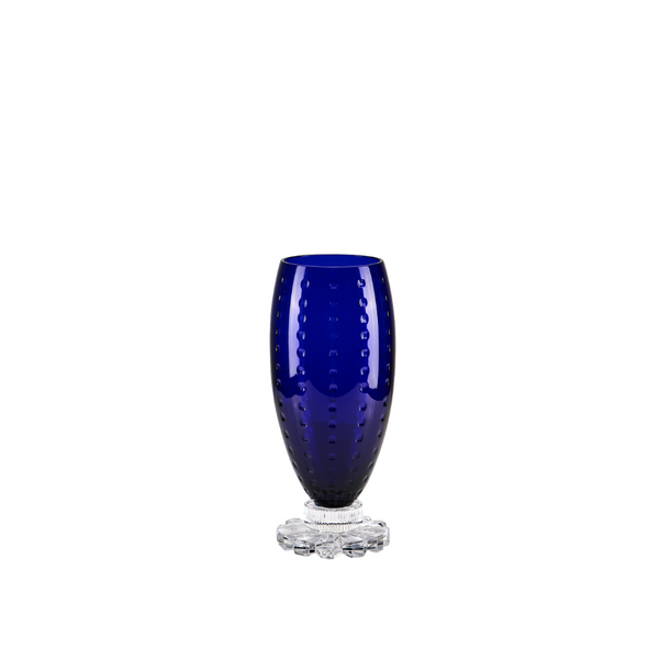 Blue crystal glass vase with textured design on a white background