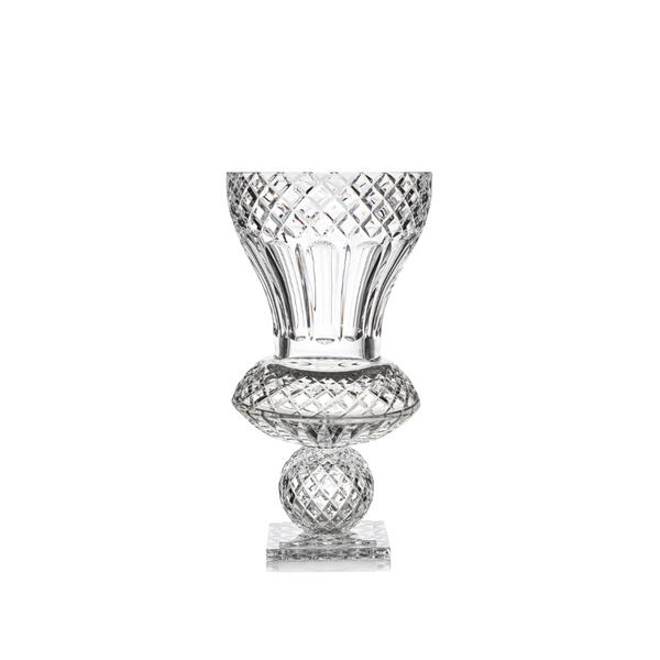 Clear crystal vase with intricate lattice design on a white background