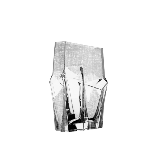 Modern crystal vase with geometric design on a white background
