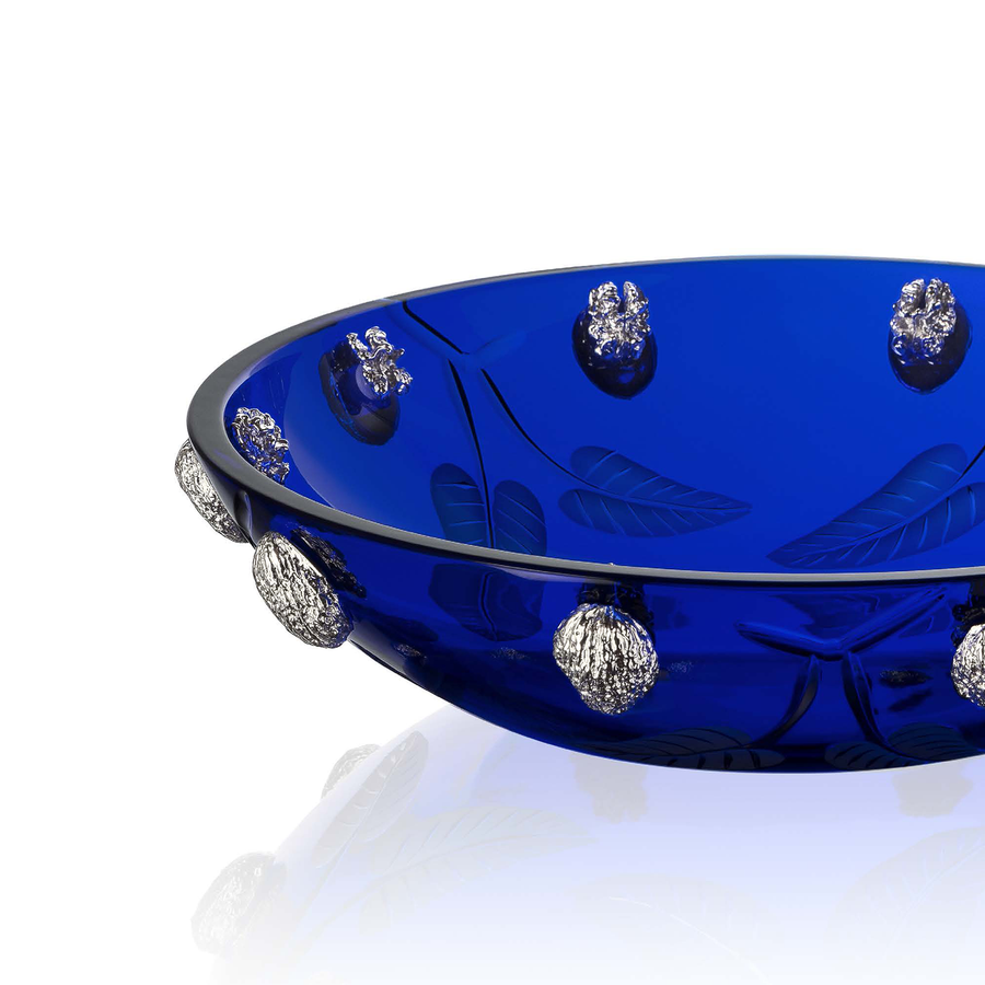 Side view of Handcrafted Mario Cioni Purpose Blue Bowl with nickel walnut accents, engraved leaves, and deep blue crystal, made in Italy for luxury decor.