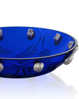 Close look of Handcrafted Mario Cioni Purpose Blue Bowl with nickel walnut accents, engraved leaves, and deep blue crystal, made in Italy for luxury decor.