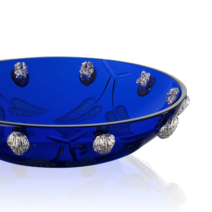 Close look of Handcrafted Mario Cioni Purpose Blue Bowl with nickel walnut accents, engraved leaves, and deep blue crystal, made in Italy for luxury decor.