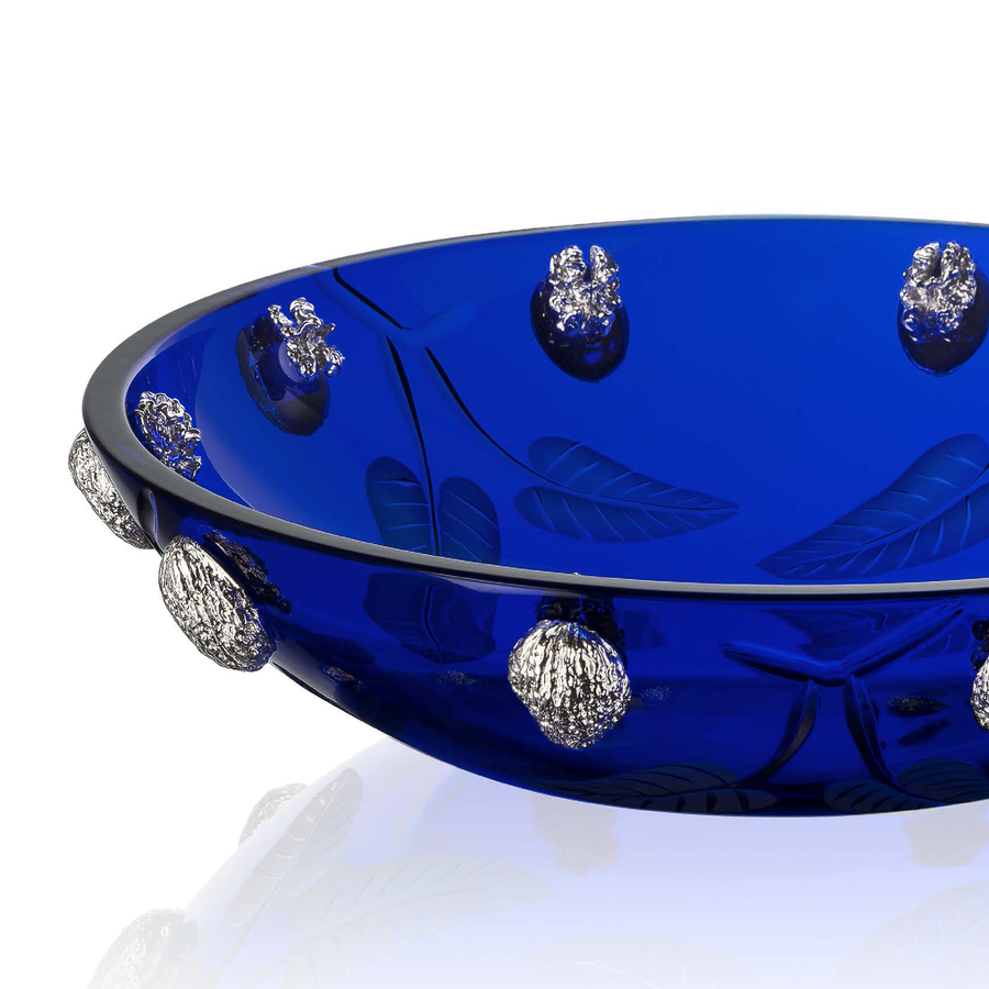 Close look of Mario Cioni Crystal Purpose Blue Large Bowl Nickel Walnuts by Tondo Doni on white back ground available at Spacio India for luxury home decor accessories collection of Bowls.