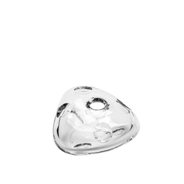 Clear heart-shaped crystal centrepiece on a white background