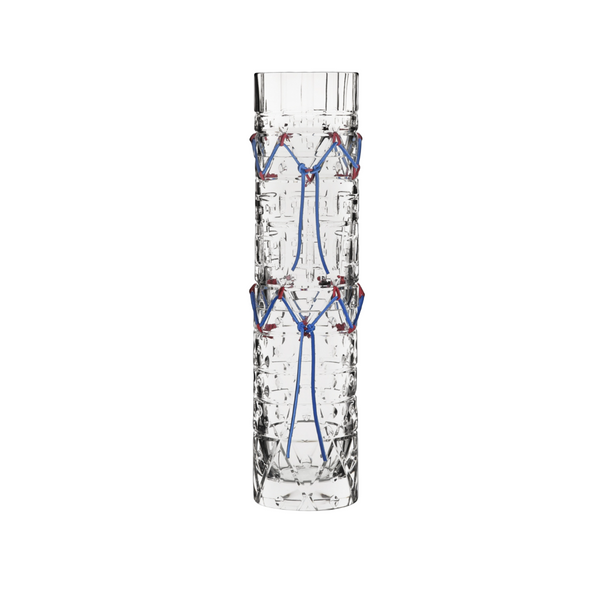 Clear crystal vase with blue and red decorative elements on a white background