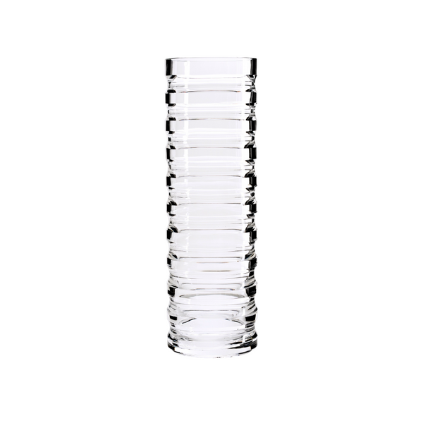 Clear crystal vase with vertical ridges on a white background