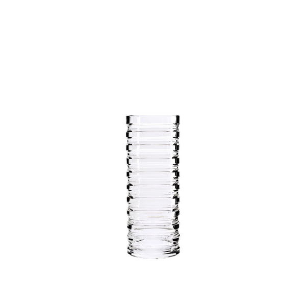 Clear crystal vase with vertical ridges on a white background