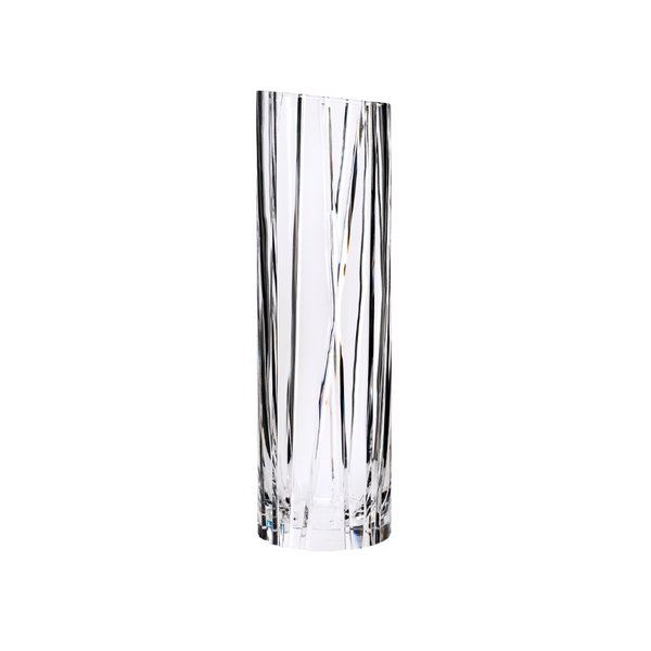 Clear crystal vase with wavy design on a white background