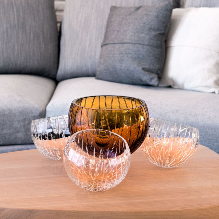 Mario Cioni Crystal Nova with 4 bowls elements on coffee table in living room interior available at Spacio India for luxury home decor collection of decorative bowls.