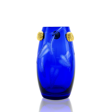 Mario Cioni Purpose Blue Crystal Vase with gold walnut accents, hand-etched leaf patterns, and a rich blue body. Handcrafted in Italy for luxury interiors.