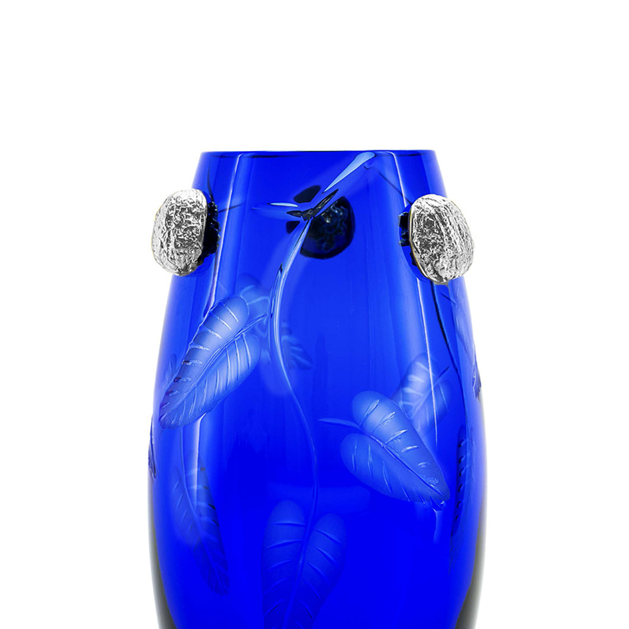 Close look of Mario Cioni Crystal Purpose Blue Vase Nickel Walnuts by Tondo Doni on white back ground available at Spacio India for luxury home decor accessories collection of Vases.